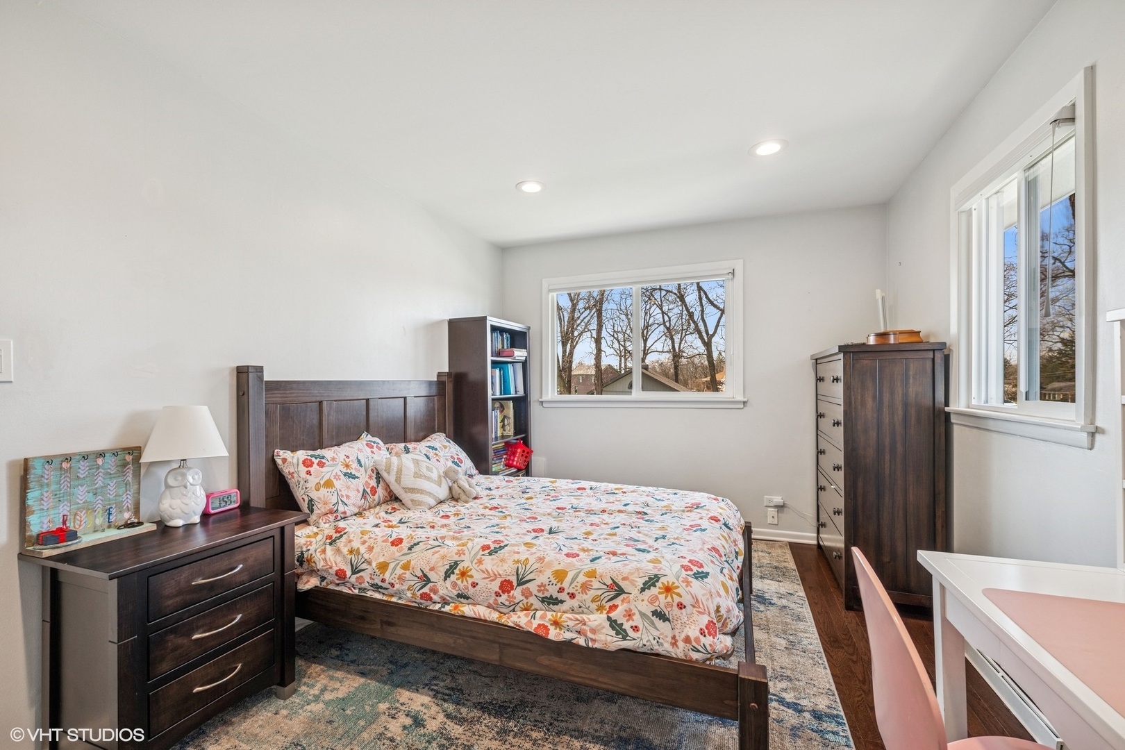 761 Kipling Place Deerfield, IL 60015 - Photo 17 of 27 a bedroom with a bed and dresser