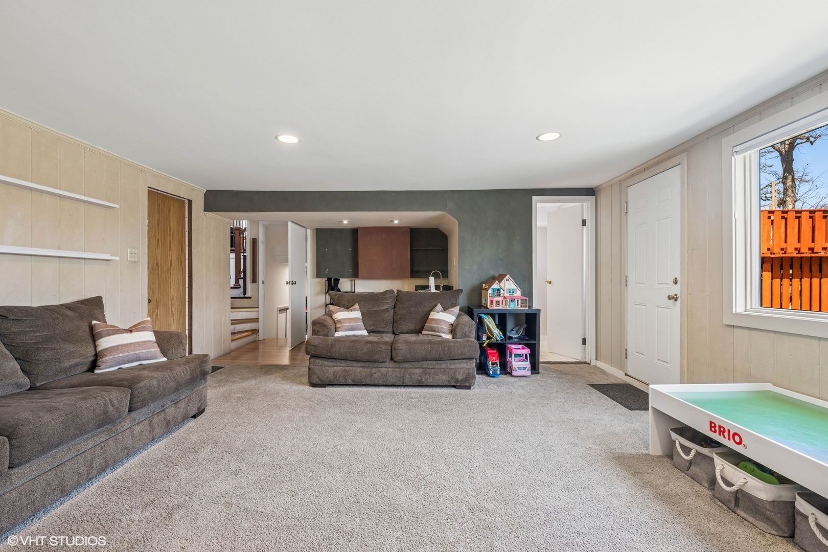 761 Kipling Place Deerfield, IL 60015 - Photo 19 of 27 a living room with furniture and a flat screen tv