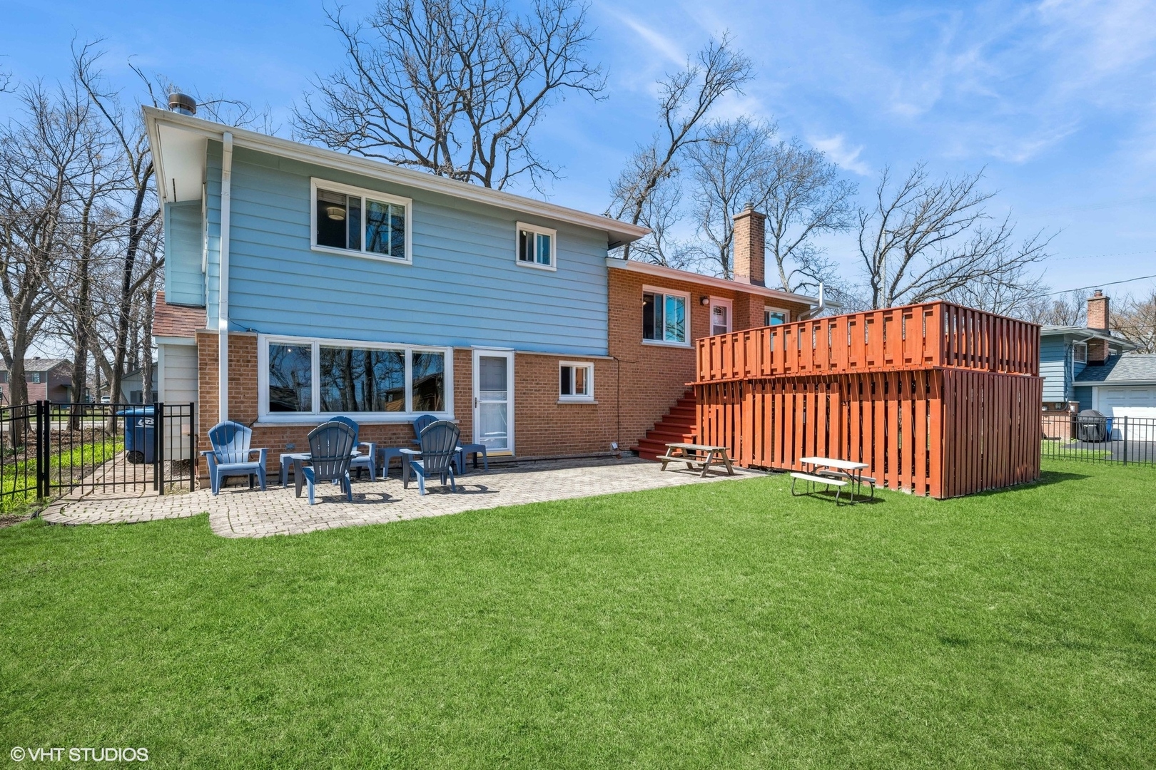 761 Kipling Place Deerfield, IL 60015 - Photo 2 of 27 a view of a chair and table in backyard of the house
