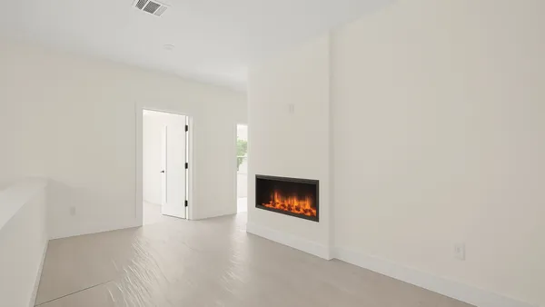 a view of an empty walk in closet