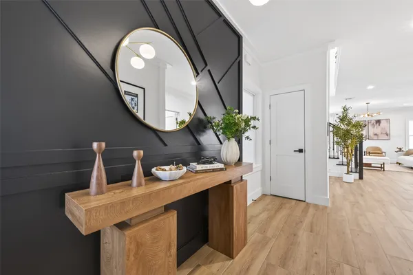 a room with furniture and a mirror