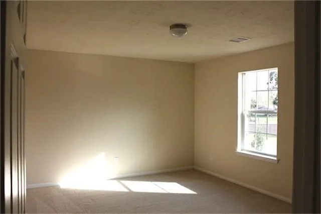an empty room with a window