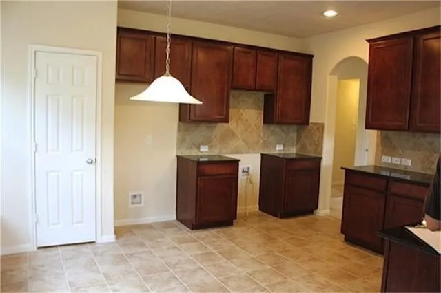a kitchen with a sink and a cabinets