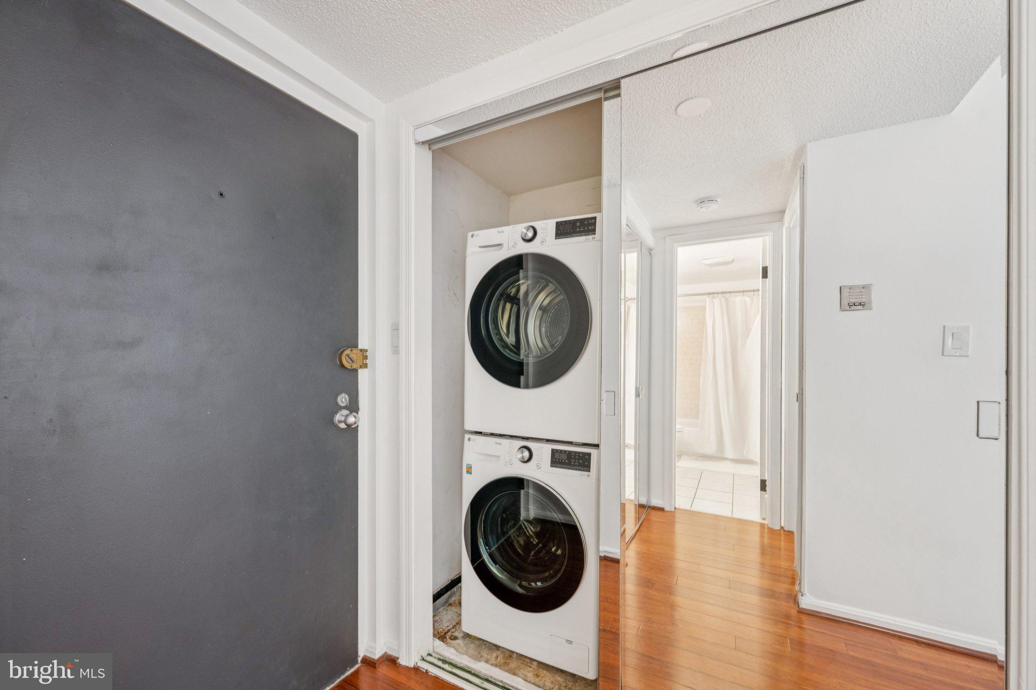 2630 Adams Mill Road Northwest, Unit 103 Washington, DC 20009 - Photo 10 of 24 a utility room with dryer and washer