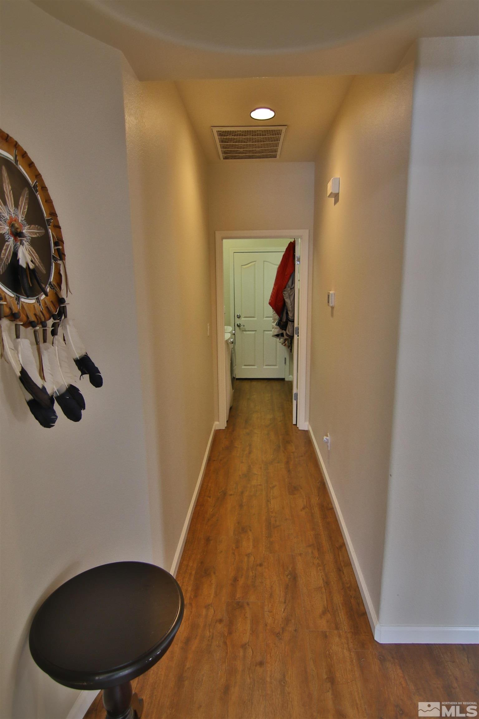 10640 Fire Poppy Circle Reno, NV 89521 - Photo 13 of 27 a view of entryway and hall with wooden floor