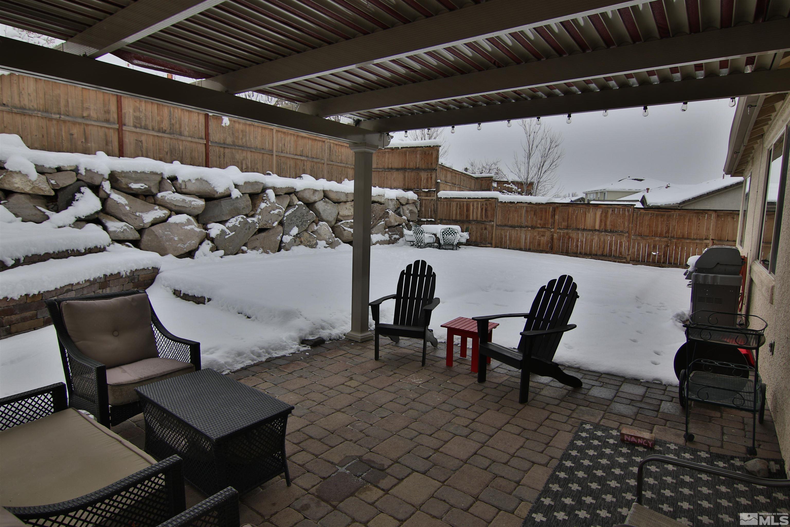 10640 Fire Poppy Circle Reno, NV 89521 - Photo 21 of 27 a living room with furniture