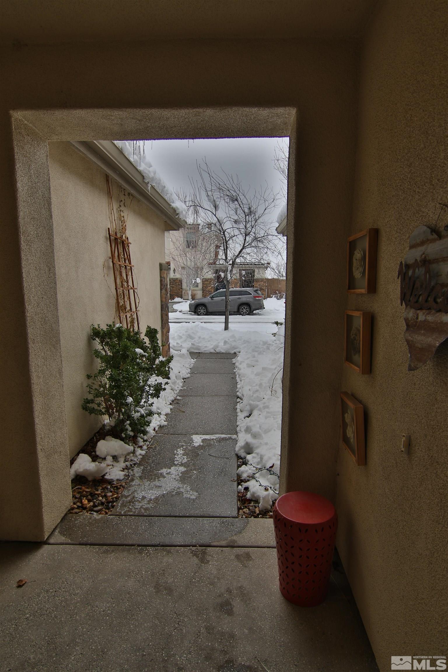 10640 Fire Poppy Circle Reno, NV 89521 - Photo 26 of 27 a view of water heater room with wooden floor