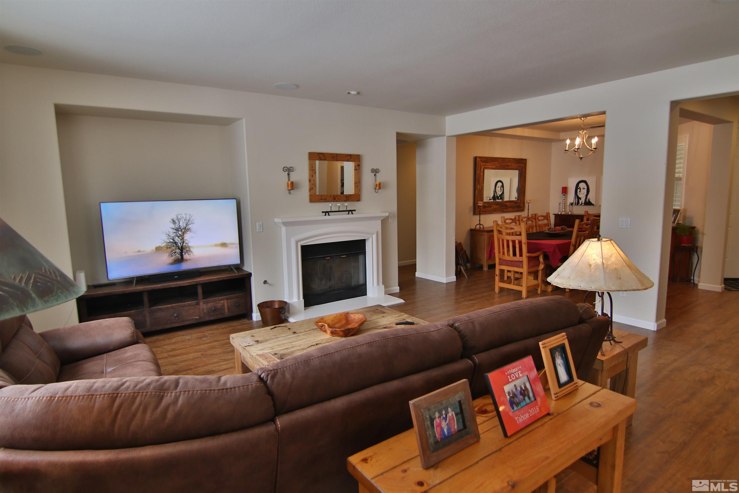 10640 Fire Poppy Circle Reno, NV 89521 - Photo 6 of 27 a living room with furniture and a fireplace