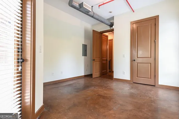 an empty room with windows