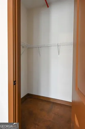 a view of small space with racks on the wall