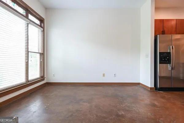 an empty room with windows