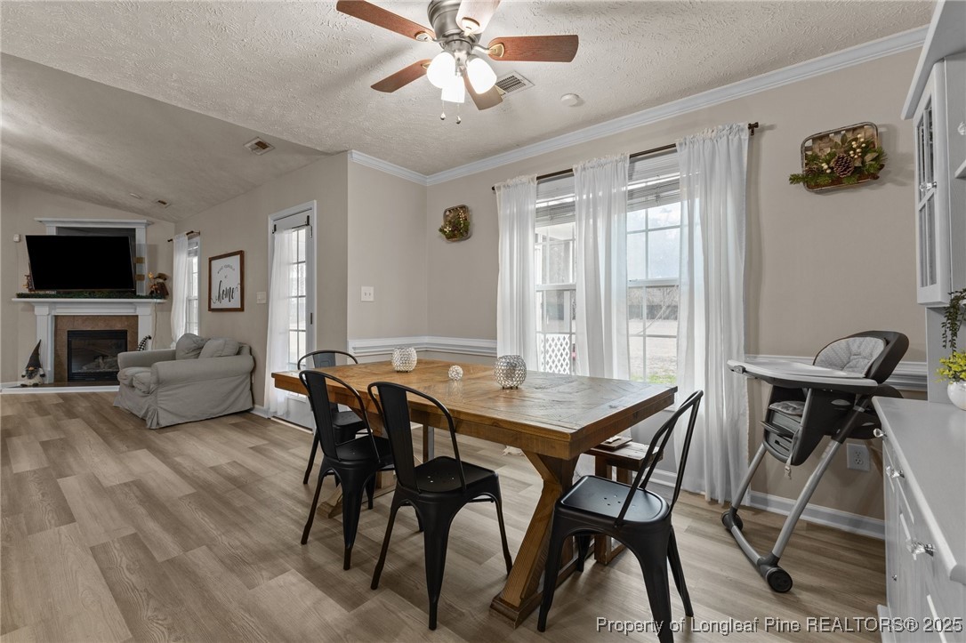 9619 Rockfish Road Raeford, NC 28376 - Photo 14 of 47 a view of a livingroom and dining room