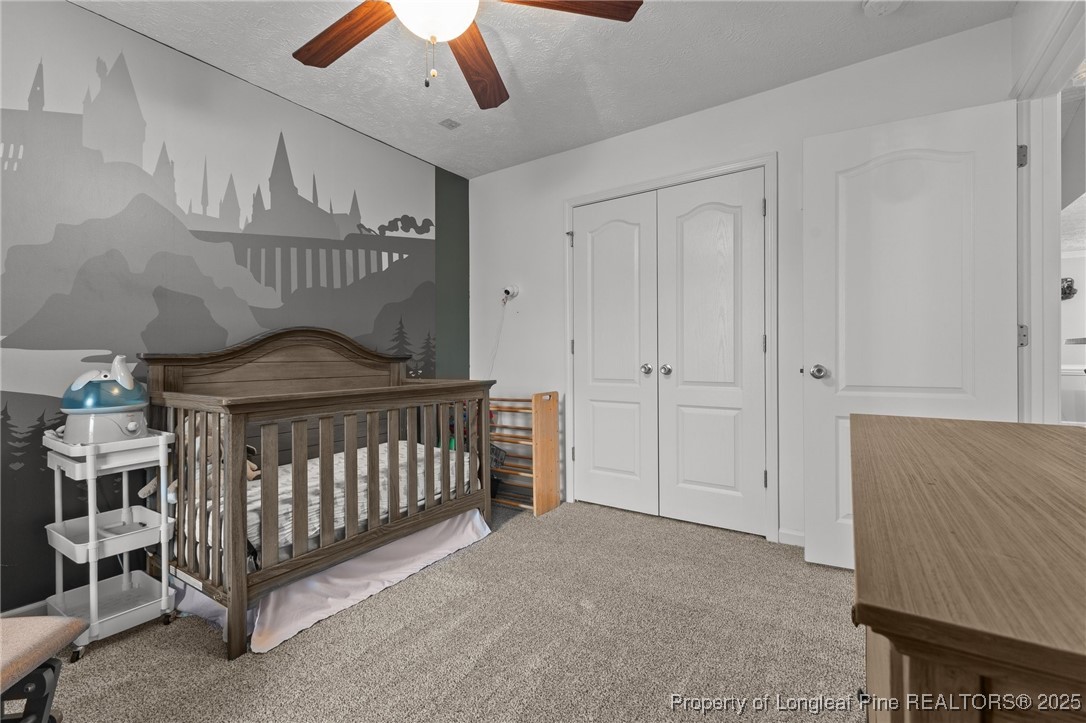 9619 Rockfish Road Raeford, NC 28376 - Photo 26 of 47 a bedroom with furniture and a window