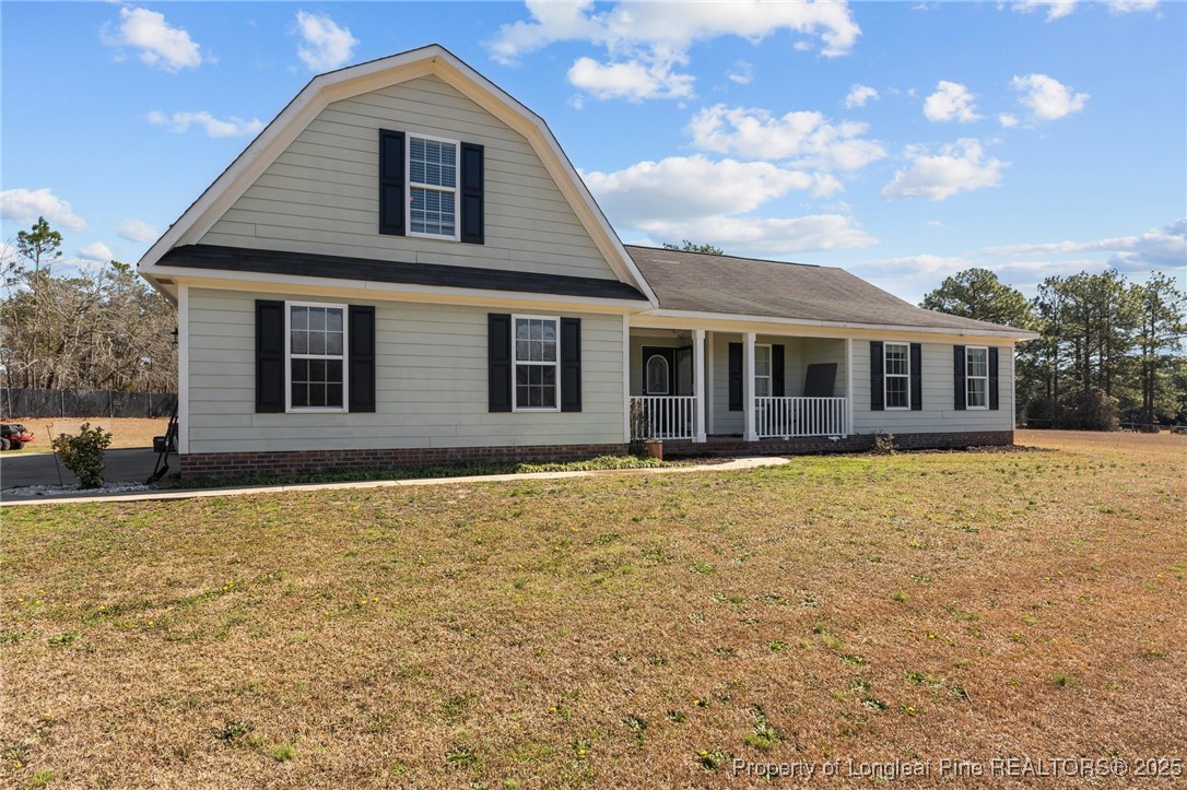 9619 Rockfish Road Raeford, NC 28376 - Photo 3 of 47 a backyard of a house