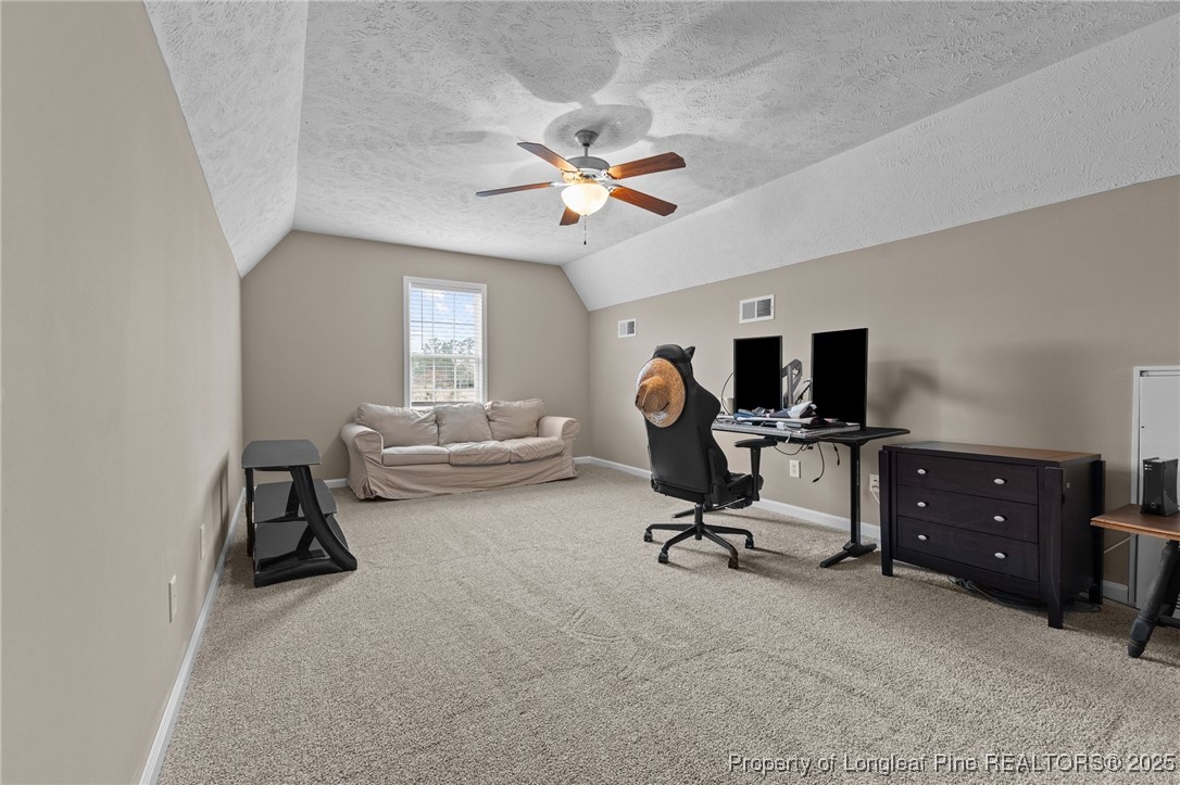 9619 Rockfish Road Raeford, NC 28376 - Photo 31 of 47 a view of a workspace with furniture and a window