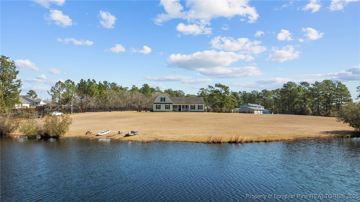 9619 Rockfish Road Raeford, NC 28376 - Photo 4 of 47 a view of a lake