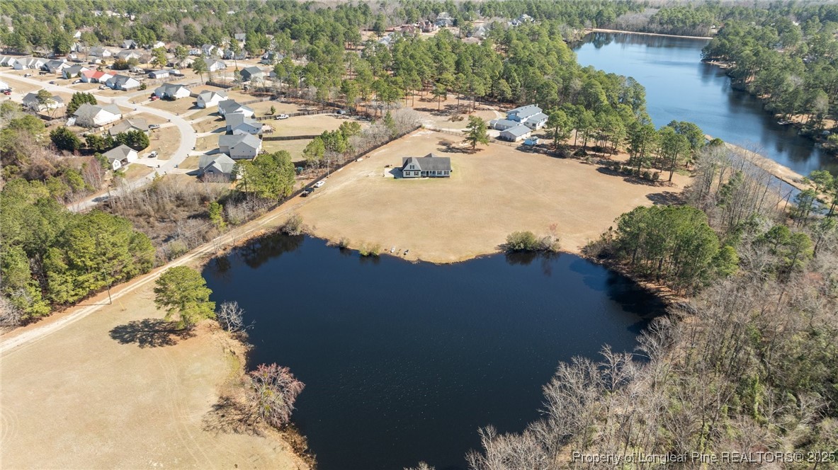 9619 Rockfish Road Raeford, NC 28376 - Photo 5 of 47 a view of lake