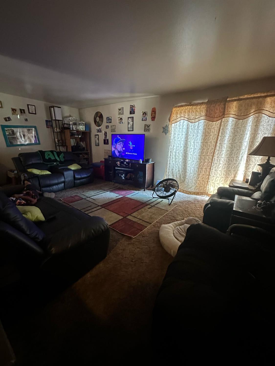 114 College Avenue Modesto, CA 95350 - Photo 4 of 19 a bed sitting in a room next to a window