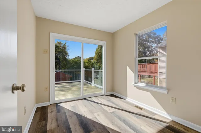 a view of a bedroom from a hallway