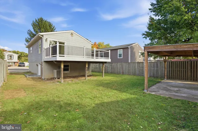a picture of a bench in front of a window