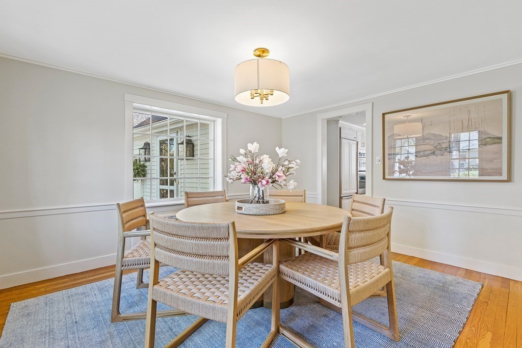 42 Fuller Brook Road Wellesley, MA 02482 - Photo 8 of 33 a view of a dining room with furniture window and wooden floor