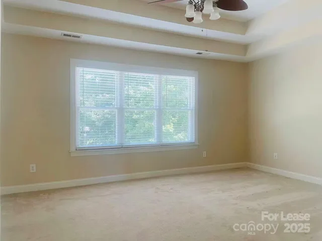 a view of a room with a fan