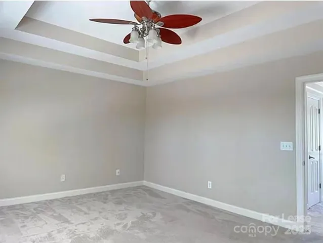 a view of a hallway with closet area