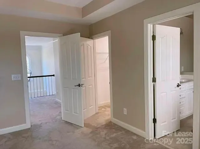 a bath tub sitting next to a shower