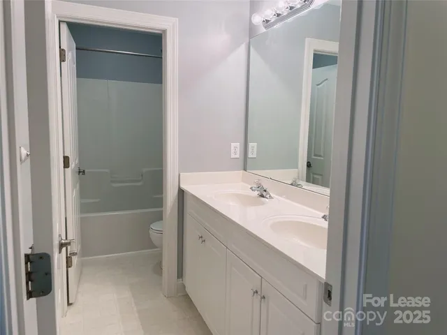 a view of a room that has a window