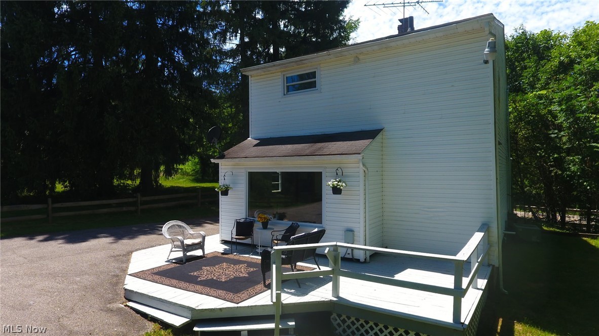 398 North Chillicothe Road Aurora, OH 44202 - Photo 35 of 39 Spacious elevated deck with a white railing system and lattice skirting