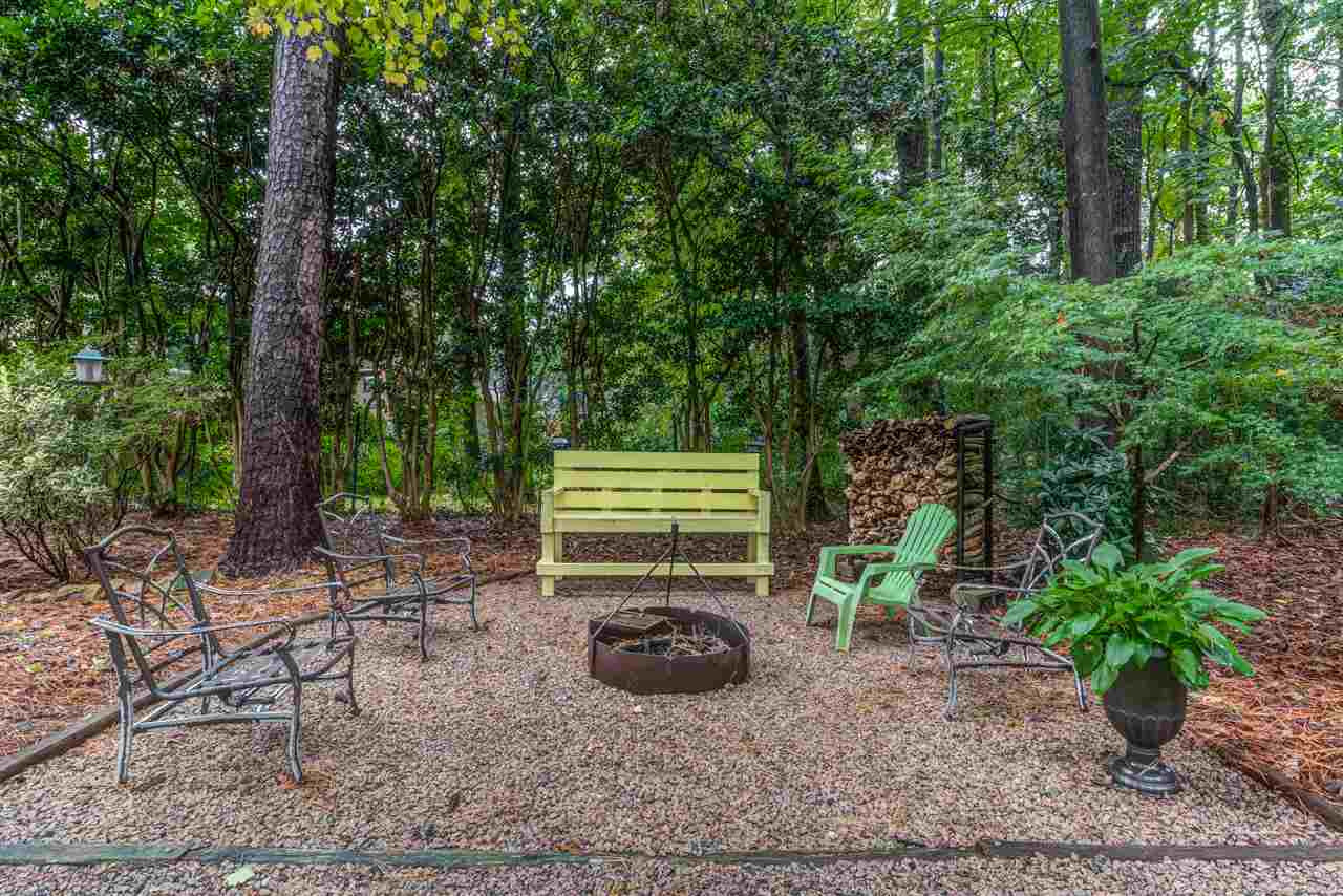 7712 Fiesta Way Raleigh, NC 27615 - Photo 26 of 30 Enjoy a quiet evening outdoors with this awesome area for a fire Firepit