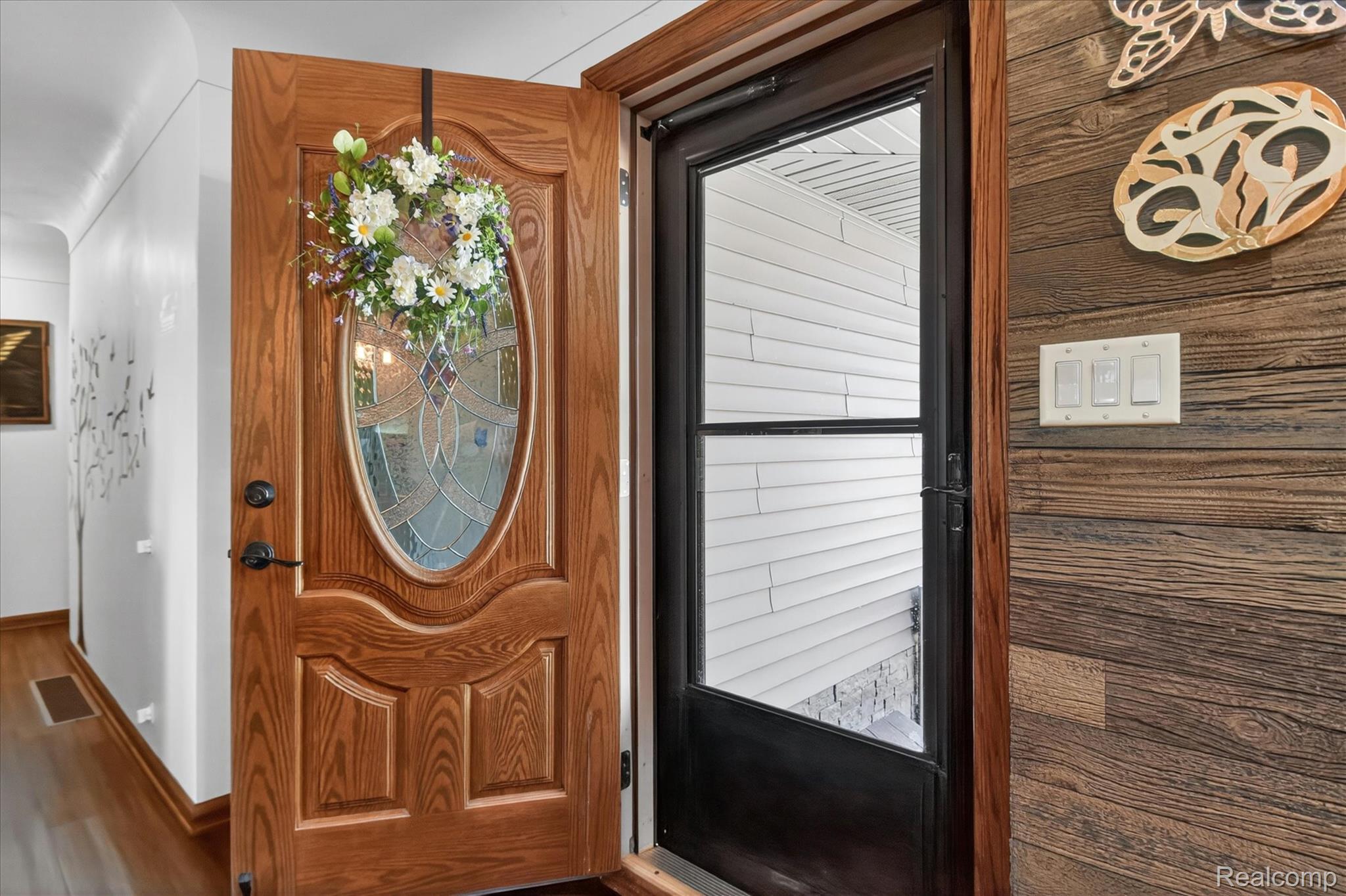 3949 West Burns Line Road Brown City, MI 48416 - Photo 7 of 70 Solid wood entry door with oval leaded glass insert