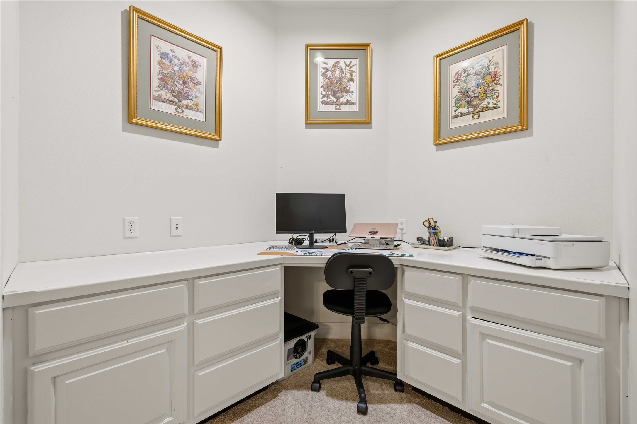15200 Spillman Ranch Loop Austin, TX 78738 - Photo 26 of 40 Dedicated corner space upstairs featuring built-in white cabinetry and a white countertop
