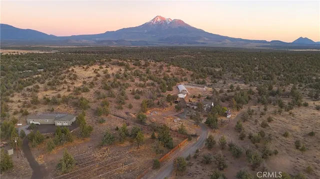 a view of a large body of water with a mountain in the background
