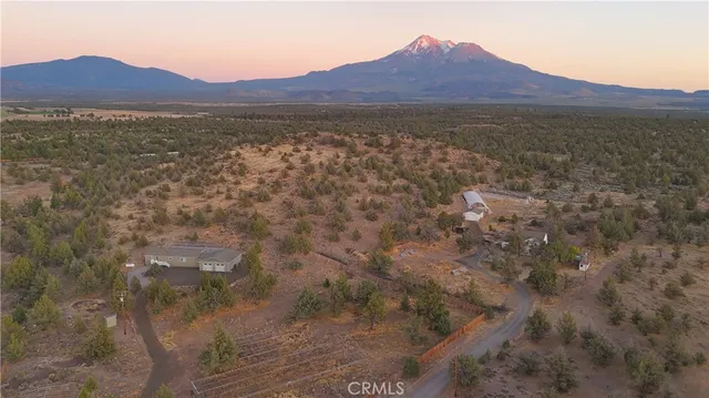 a view of a large body of water with a mountain in the background