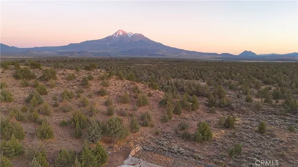 a view of a house with a mountain