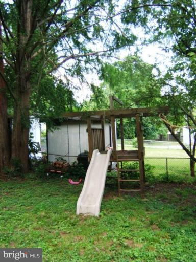 117 East 2nd Avenue Ranson, WV 25438 - Photo 25 of 26 Play area next to a great climbing tree