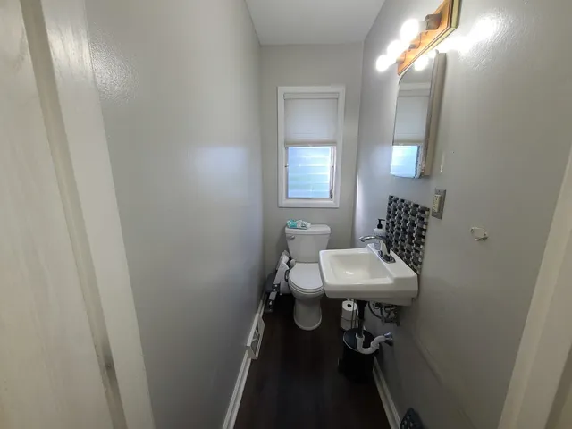 a view of a backyard with sitting area