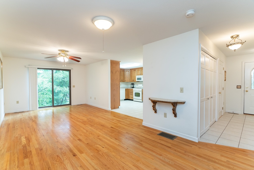 28 Hemingway Road Wilbraham, MA 01095 - Photo 35 of 42 a view of an empty room with window and wooden floor