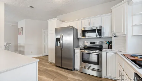 $524,900 | 248 Plaza Gardens Court, Unit 5A, Camdenton, MO 65020