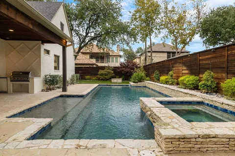 a view of an outdoor space with swimming pool