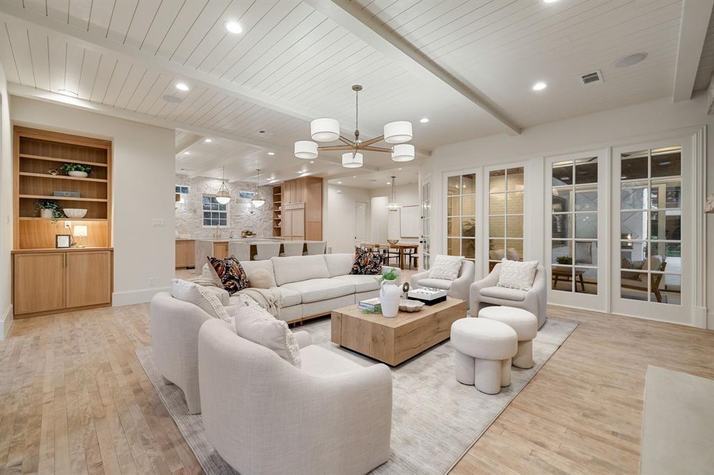 6411 Orchid Lane Dallas, TX 75230 - Photo 10 of 40 a living room with furniture and wooden floor