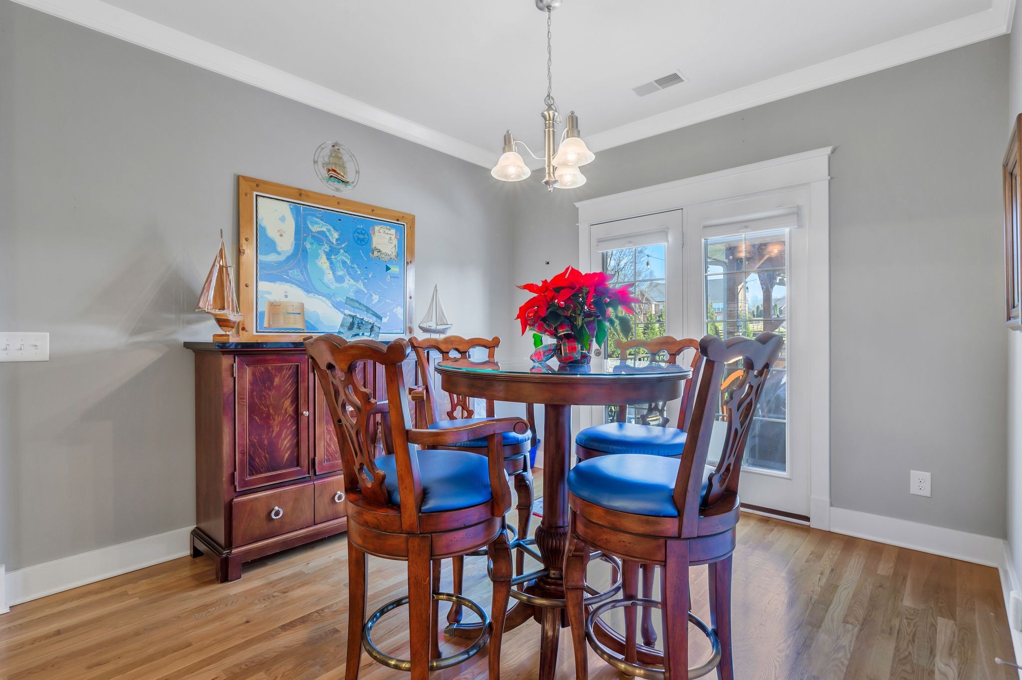 3043 Crossgate Lane Columbia, TN 38401 - Photo 12 of 45 a view of a dining room with furniture and wooden floor
