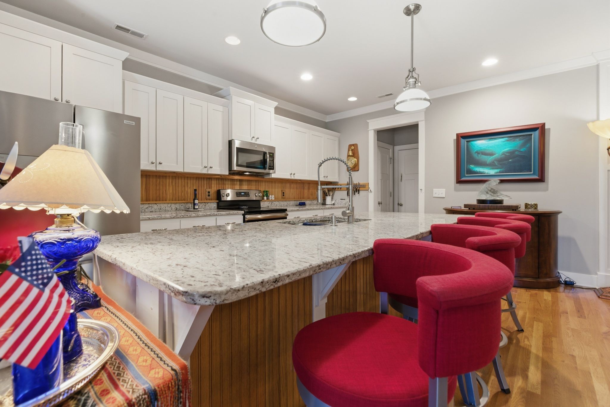 3043 Crossgate Lane Columbia, TN 38401 - Photo 16 of 45 a kitchen with stainless steel appliances granite countertop a sink a microwave a refrigerator and chairs