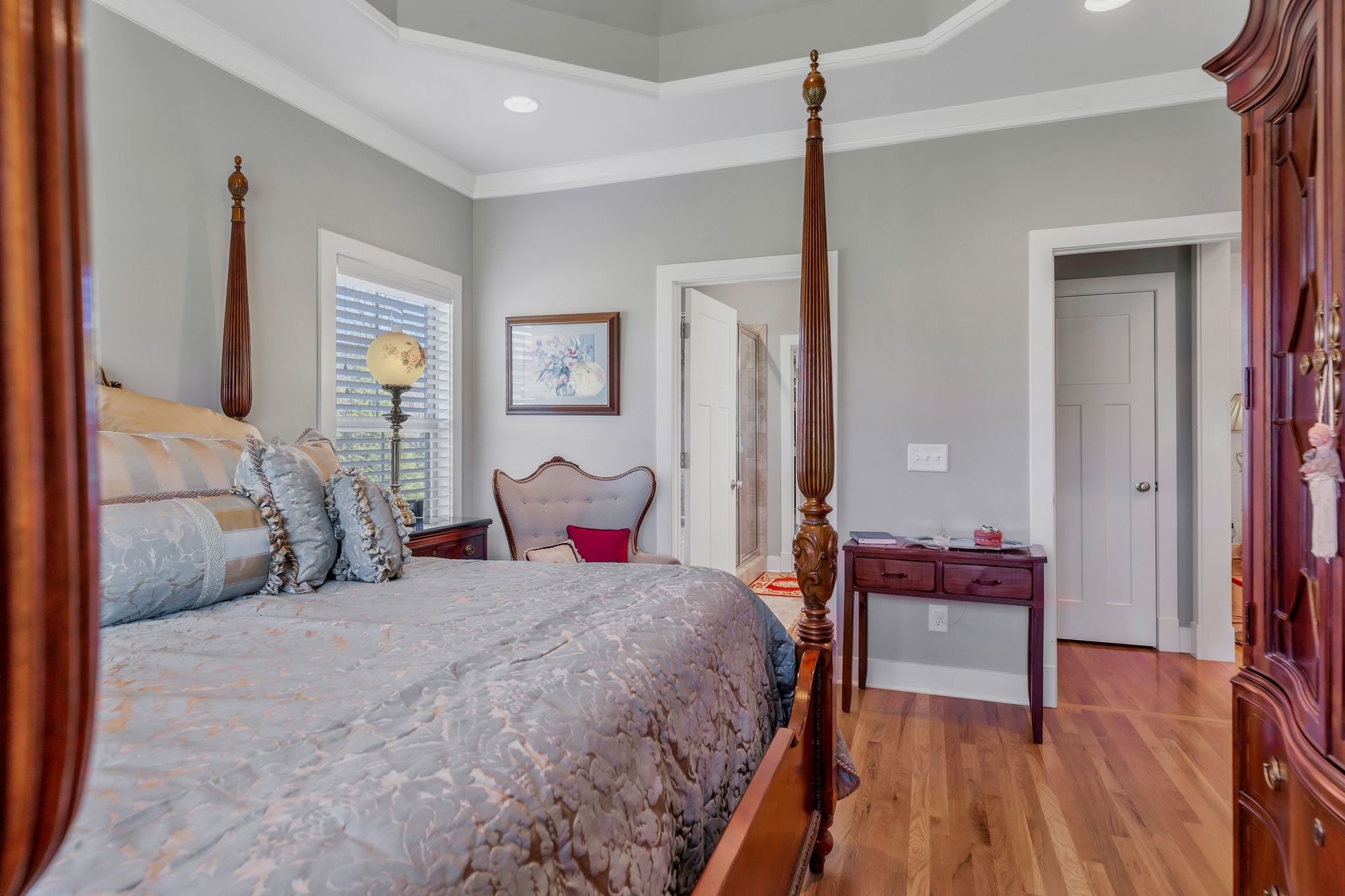 3043 Crossgate Lane Columbia, TN 38401 - Photo 22 of 45 a spacious bedroom with a bed and a table in it