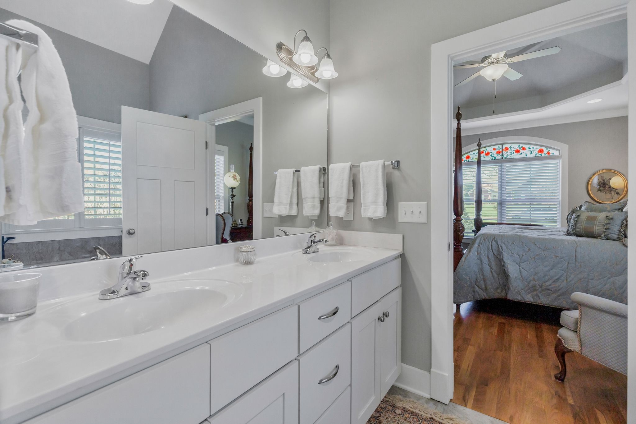 3043 Crossgate Lane Columbia, TN 38401 - Photo 23 of 45 a en suite bathroom with a double vanity sink and a mirror