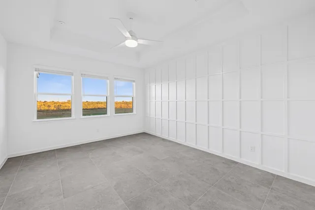 an empty room with windows