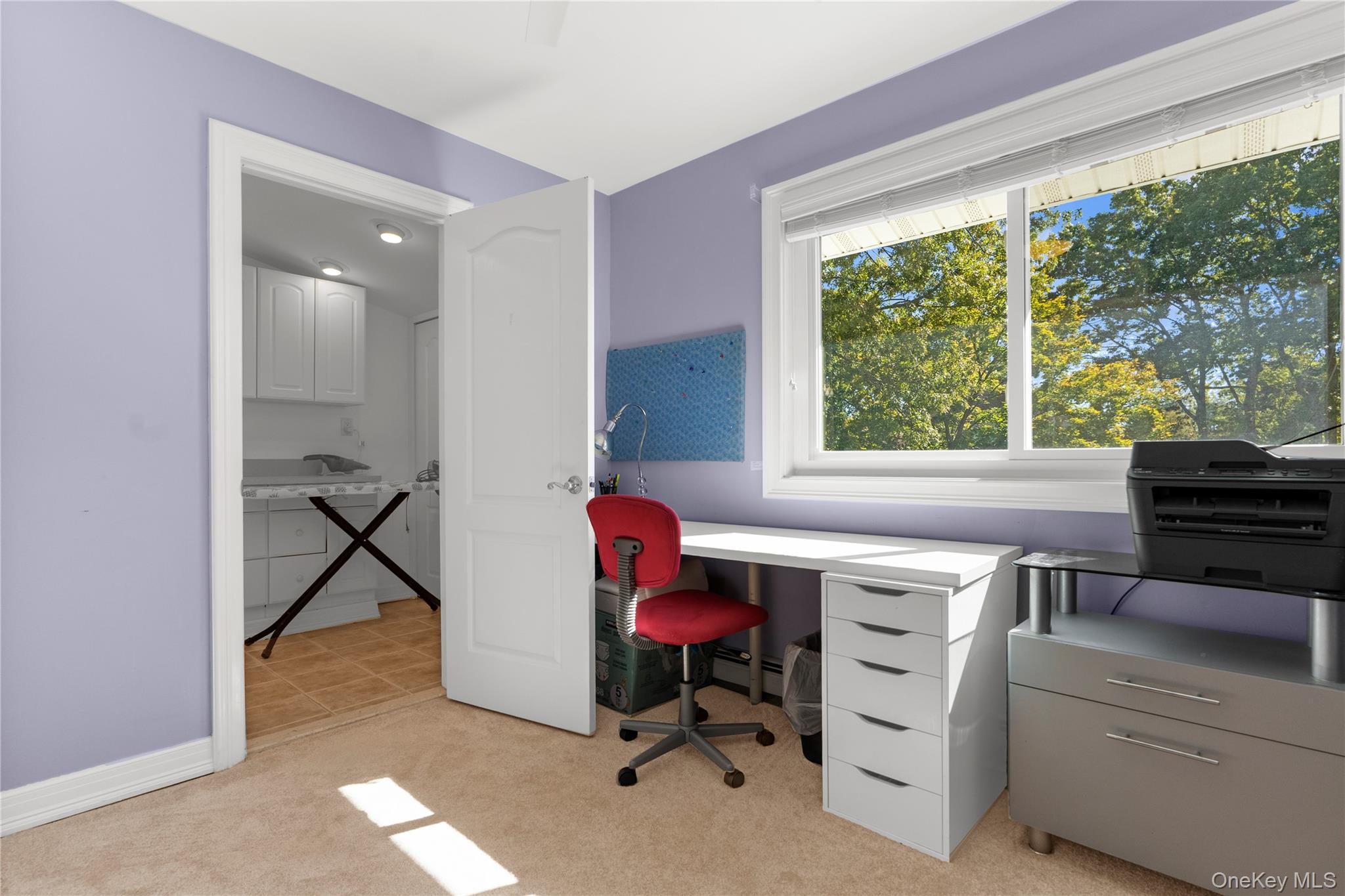 28 Annandale Road Commack, NY 11725 - Photo 23 of 29 Office area with light colored carpet and baseboards
