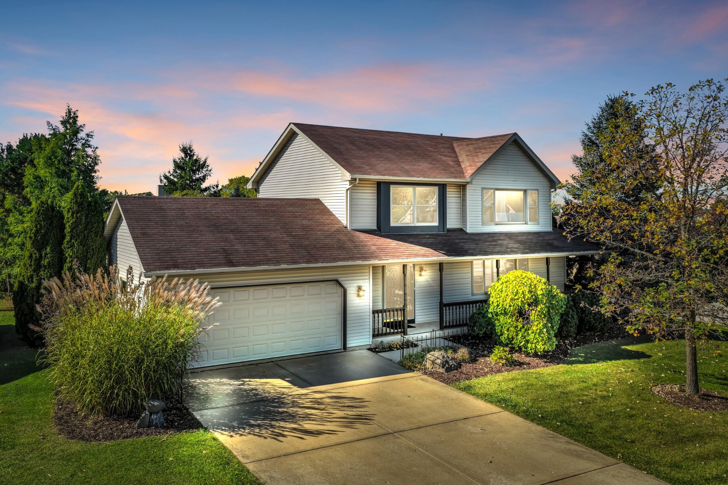2520 Amber Lane Mount Pleasant, WI 53406 - Photo 1 of 48 Twilight on Amber Lane
