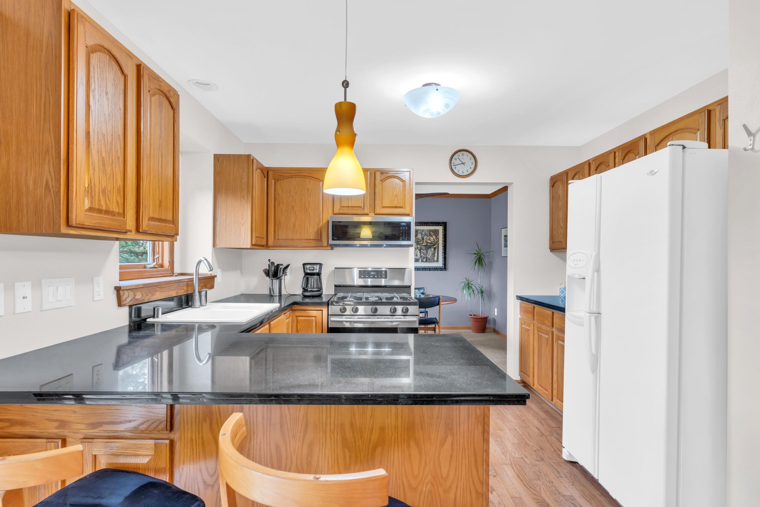 2520 Amber Lane Mount Pleasant, WI 53406 - Photo 8 of 48 Breakfast Bar & Kitchen